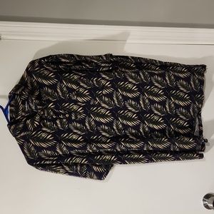 This is a slightly tropical dark blue, with tropical palm tree leaves,men's t